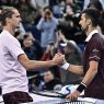 Alexander Zverev et Novak Djokovic après leur match à Pékin (China Open)